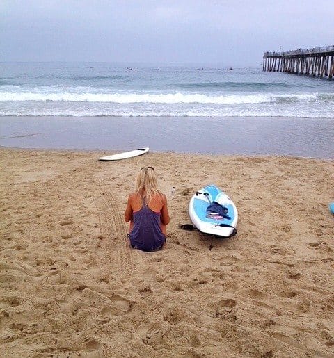 Sara and paddle board